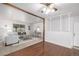 Inviting living room with lots of natural light, cozy seating, and a stylish rug at 7720 Kendall St, Arvada, CO 80003