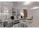Cozy living room with comfortable seating, modern decor, and ample lighting at 7720 Kendall St, Arvada, CO 80003