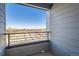 Balcony view features clear blue skies overlooking an urban landscape, perfect for relaxing outdoors at 374 North Geneva, Aurora, CO 80010
