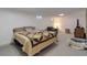 Large basement space featuring carpet, windows, and a comfortable seating area at 8221 Ralph Ln, Denver, CO 80221