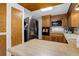 Traditional kitchen featuring wooden cabinets, stainless steel appliances and light wood countertops at 8221 Ralph Ln, Denver, CO 80221