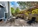 Backyard patio with multiple seating options and a fire pit at 18572 E Tanforan Pl, Aurora, CO 80015