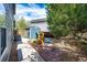 Backyard with shed and play structure set in a mulch bed at 18572 E Tanforan Pl, Aurora, CO 80015