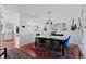 Bright dining room with stylish seating and artistic decor provides an inviting atmosphere at 17900 E Mexico Dr, Aurora, CO 80017