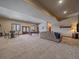 Open basement area featuring a pool table, a seating area, and a bar table at 28592 Hummingbird Hill Rd, Conifer, CO 80433