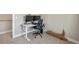 Office space featuring a white stand-up desk with dual monitors and driftwood decor at 1530 Terry St, Longmont, CO 80501