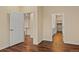Bedroom showing access to the ensuite bathroom and a walk-in closet at 152 Ambrose St, Erie, CO 80516