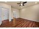Comfortable bedroom featuring hardwood floors and a ceiling fan at 152 Ambrose St, Erie, CO 80516