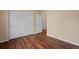 Bedroom features wood floor and a closet with large sliding doors at 152 Ambrose St, Erie, CO 80516