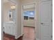 Hallway connects the bathroom, the bedroom, and the closet for easy access at 152 Ambrose St, Erie, CO 80516