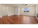Spacious living room features hardwood floors, lots of windows, and an open layout at 152 Ambrose St, Erie, CO 80516