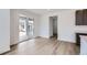 Bright dining area features sliding glass doors leading to a back patio with a view at 4588 Thistle Dr, Brighton, CO 80601