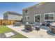 Nice backyard with outdoor seating, BBQ grill, and artificial grass at 417 S Ouray St, Aurora, CO 80017
