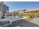 Backyard featuring patio, seating area, grill, and privacy fence at 417 S Ouray St, Aurora, CO 80017
