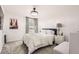 Serene bedroom with a luxurious bed, soft lighting, and chic decor for ultimate relaxation at 417 S Ouray St, Aurora, CO 80017