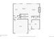 First floor plan featuring kitchen, dining room, living room, and garage at 417 S Ouray St, Aurora, CO 80017