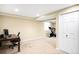 Finished basement offers a workout area, office space, and carpeted floors at 20389 E Powers Pl, Centennial, CO 80015
