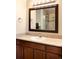 The full bathroom features a single sink vanity with a view of the shower at 20389 E Powers Pl, Centennial, CO 80015