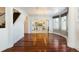 Elegant dining room with hardwood floors and chandelier at 1395 Bellaire St, Denver, CO 80220