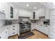 Modern kitchen with stainless steel appliances and white cabinetry at 1395 Bellaire St, Denver, CO 80220