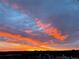 Spectacular orange sky view overlooking the city skyline at sunset in this luxury apartment at 1900 E Girard Pl # 907, Englewood, CO 80113