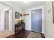 Inviting entryway featuring wood floors, tasteful decor, and a charming welcome for guests at 1900 E Girard Pl # 907, Englewood, CO 80113