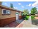 Charming brick home with well-maintained front yard and walkway at 500 S Pennsylvania St # 520, Denver, CO 80209