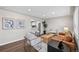 Comfortable living room with stylish furnishings and a view to the kitchen and bar area at 500 S Pennsylvania St # 520, Denver, CO 80209