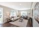 Sun-filled living room featuring hardwood floors, stylish seating, and an open layout, perfect for entertaining at 500 S Pennsylvania St # 520, Denver, CO 80209