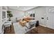 Sunlit living room featuring modern furniture, hardwood floors and a cozy atmosphere at 500 S Pennsylvania St # 520, Denver, CO 80209