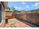 Private patio with flagstone pavers, enclosed by a wooden fence providing an outdoor space at 500 S Pennsylvania St # 520, Denver, CO 80209