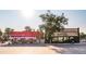 Street view of Bonnie Brae's popular shops with red awnings and neighborhood charm at 500 S Pennsylvania St # 520, Denver, CO 80209