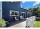 Inviting back deck with modern seating and sliding glass doors to home at 9924 Silver Maple Way, Highlands Ranch, CO 80129