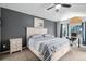 Relaxing bedroom with vaulted ceilings, dark accent wall, and natural light at 9924 Silver Maple Way, Highlands Ranch, CO 80129