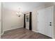 Well-lit dining area featuring modern fixtures and dark window curtains at 3600 S Pierce St # 5-101, Denver, CO 80235