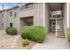 Attractive exterior with neat landscaping, stone pathway, and well-maintained siding at 3600 S Pierce St # 5-101, Denver, CO 80235