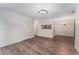 Bright living area offering ample space and a view of the kitchen at 3600 S Pierce St # 5-101, Denver, CO 80235