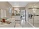 The main bathroom features a soaking tub, shower, and double vanity, creating a spa-like retreat at 11821 Discovery Ln, Parker, CO 80138