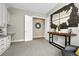 Another view of the home office shows decor, neutral colors, and entrance to another room at 11821 Discovery Ln, Parker, CO 80138
