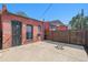 Private backyard with a patio and fire pit at 561 Cherokee St, Denver, CO 80204