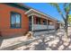 Charming brick home with a covered porch at 561 Cherokee St, Denver, CO 80204