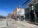 View of shops and restaurants on a city street at 561 Cherokee St, Denver, CO 80204