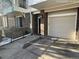 Brick building with garage and walkway at 2111 Enterprise St, Superior, CO 80027
