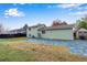 Spacious backyard with green lawn and patio area, perfect for entertaining at 15628 E Girard Pl, Aurora, CO 80013