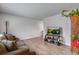 Modern living room design with a comfortable seating area, ideal for relaxation and social gatherings at 15628 E Girard Pl, Aurora, CO 80013