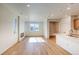 Spacious layout connecting the living area and kitchen, perfect for entertaining at 21292 E 63Rd Dr, Aurora, CO 80019