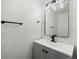 Modern bathroom vanity featuring sleek fixtures, contemporary lighting, and ample storage at 1545 S Ouray Cir # A, Aurora, CO 80017