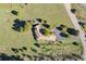 Overhead aerial shot of a sprawling property surrounded by picturesque trees and nature at 1621 Baneberry Ln, Golden, CO 80401