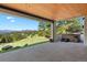 Back porch featuring mountain views and a hot tub at 1621 Baneberry Ln, Golden, CO 80401