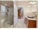 Elegant bathroom with a glass shower, modern fixtures, and a stylish vessel sink at 1621 Baneberry Ln, Golden, CO 80401